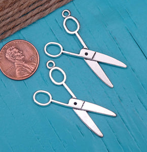 12 pc scissors charm . stainless steel charm ,very high quality.Perfect for jewery making and other DIY projects