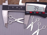 12 pc scissors charm . stainless steel charm ,very high quality.Perfect for jewery making and other DIY projects