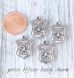 12 pc Police badge charm, police badge, officer badge charm. Alloy charm, very high quality.Perfect for jewery making and other DIY projects