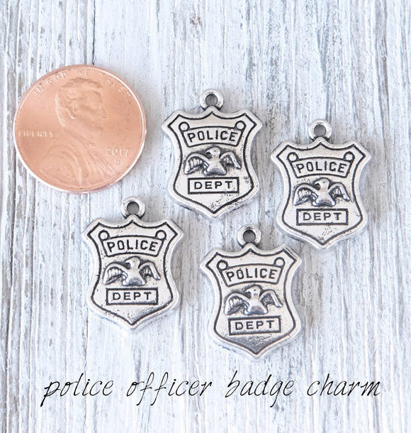 12 pc Police badge charm, police badge, officer badge charm. Alloy charm, very high quality.Perfect for jewery making and other DIY projects