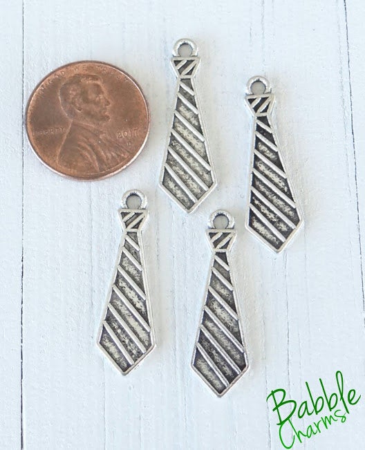 12pc Tie, Tie charm. Alloy charm ,very high quality.Perfect for jewery making and other DIY projects