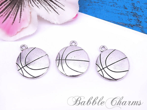 12 pc basketball, basketball charm, sports charms. Alloy charm ,very high quality.Perfect for jewery making and other DIY projects